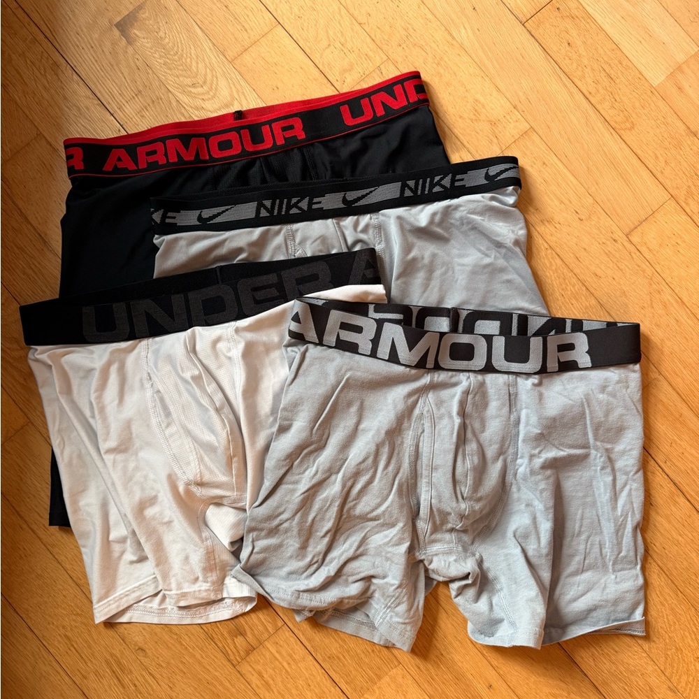 4 pair Nike and Under Armour Boxers